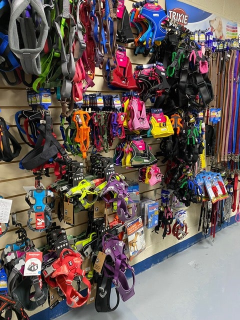 Full shelves of various Dog harness